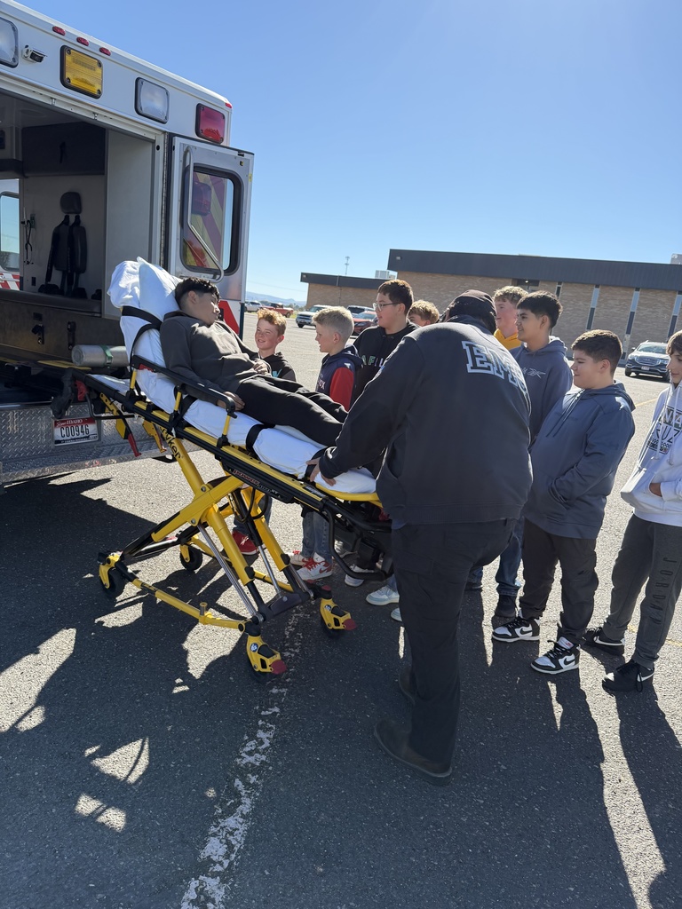 Student on ambulance stretcher