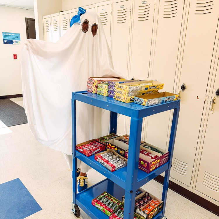 ghost with candy cart