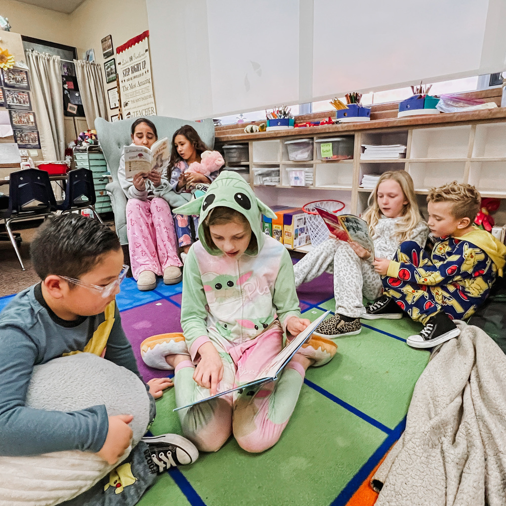 4th graders reading to 1st graders