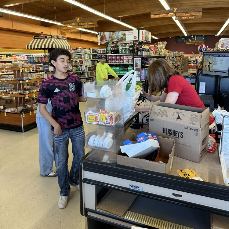 paying at the grocery store
