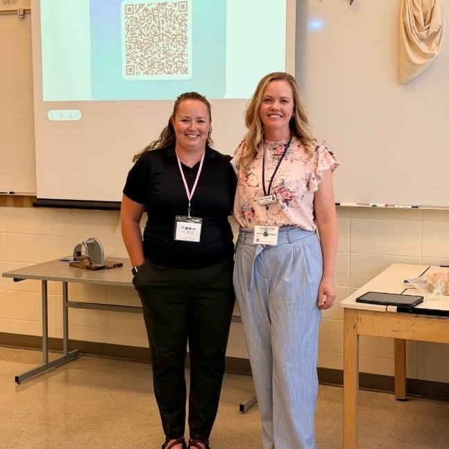 Mrs Dean and colleague
