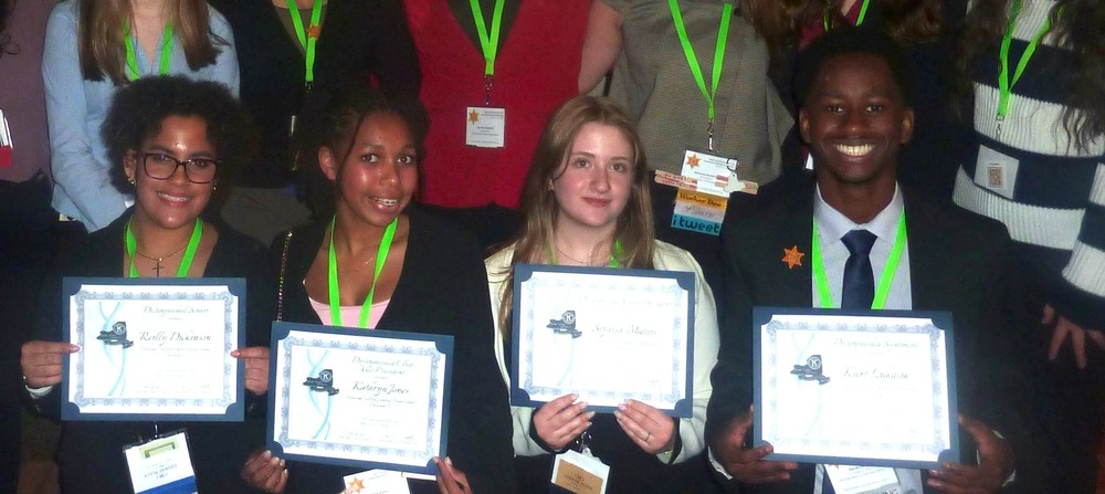 Key club members with certicates