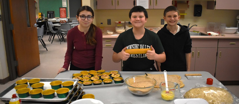 students with baking items