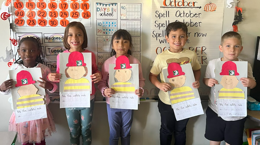 students with fire safety posters