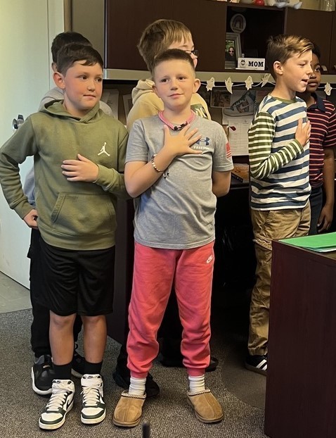 student saying pledge of allegiance