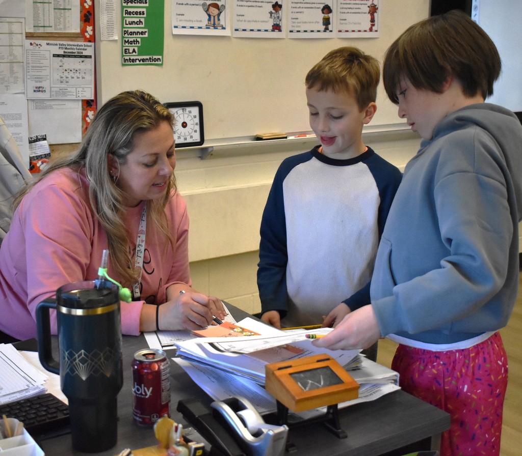 students with teacher