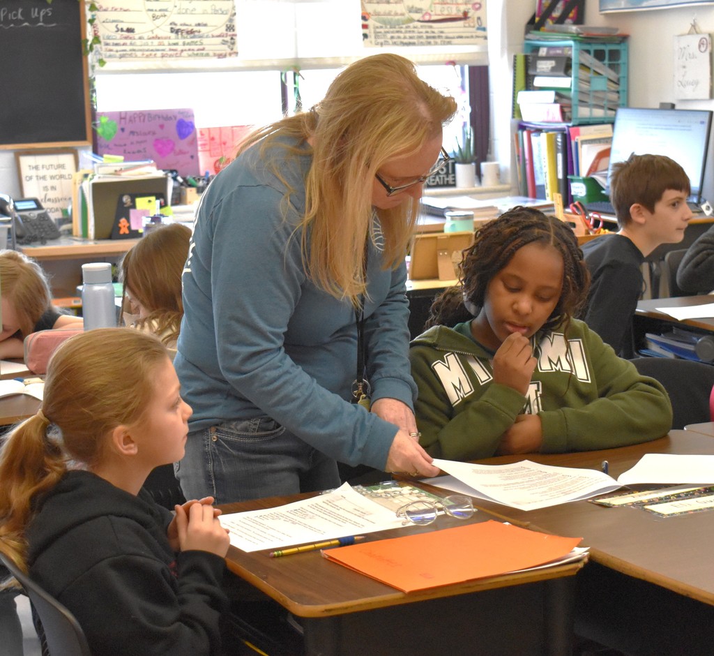 students with teacher