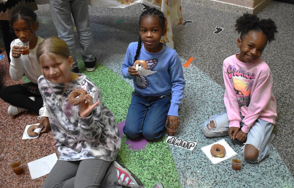 students with donuts