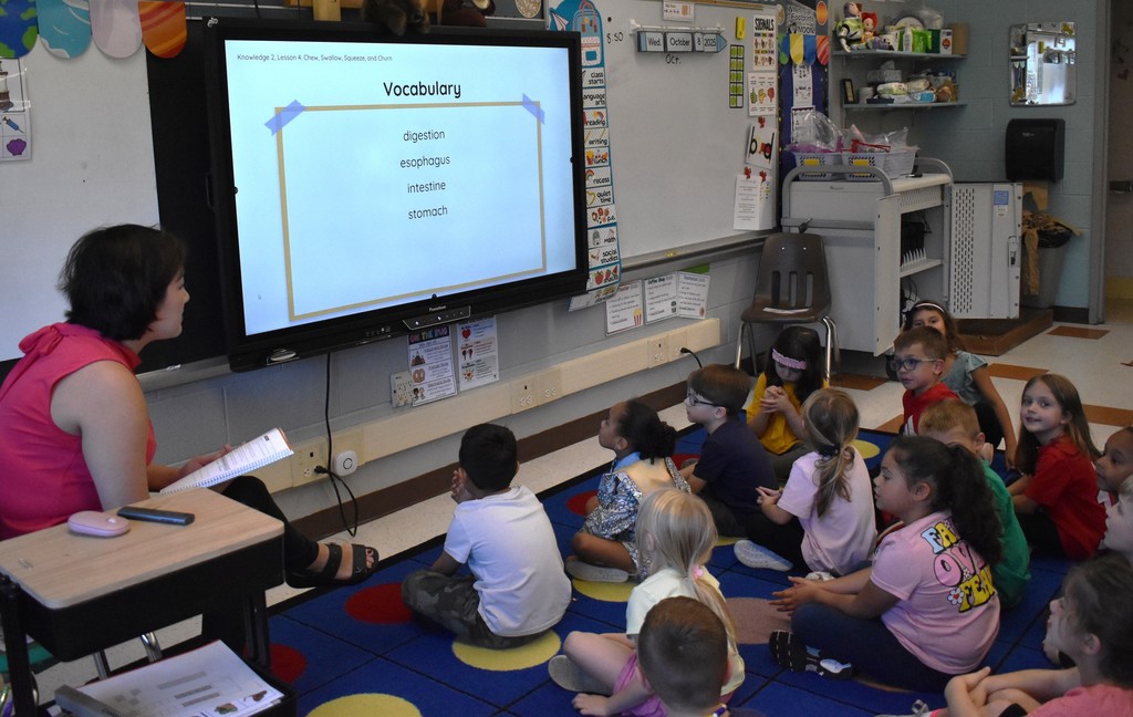 teacher with students