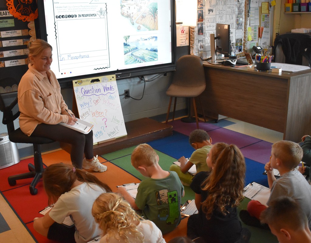 teacher with students