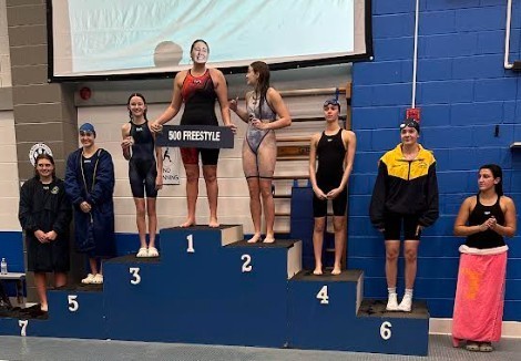swimmer on podium