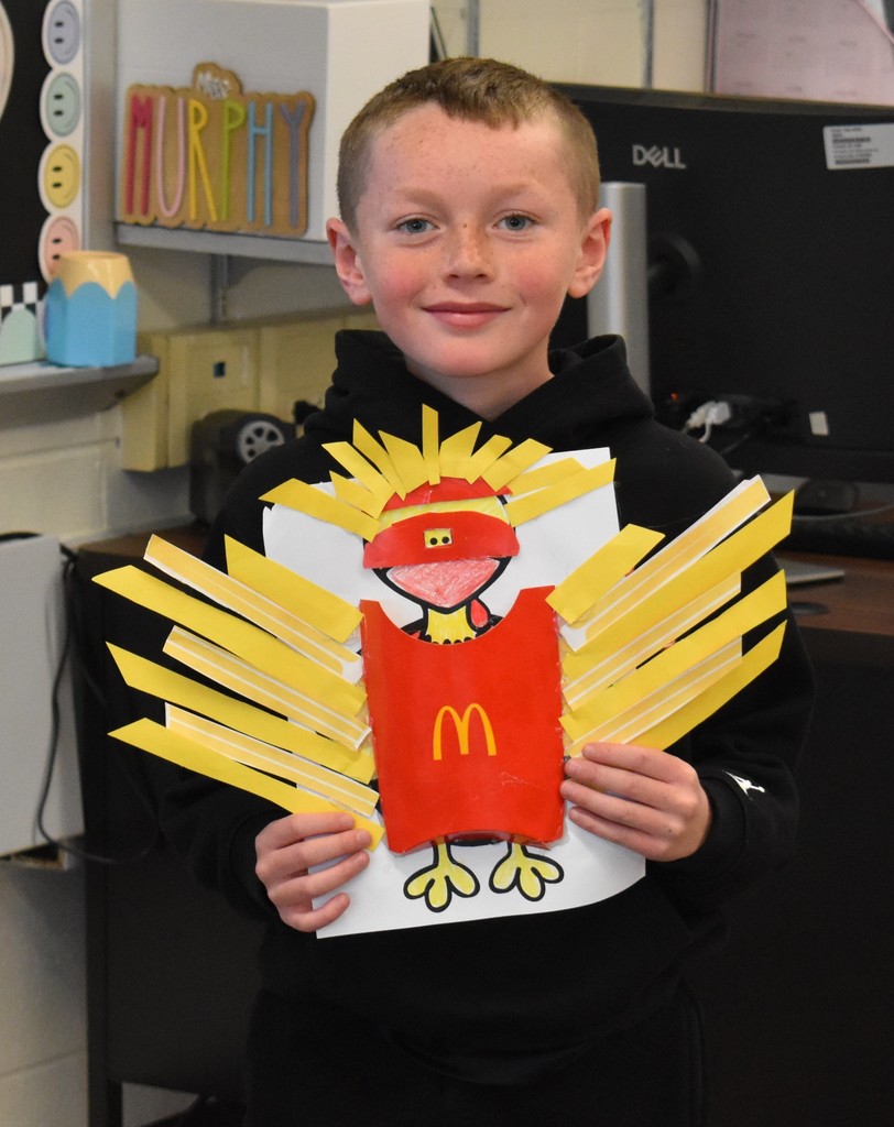 student with artwork