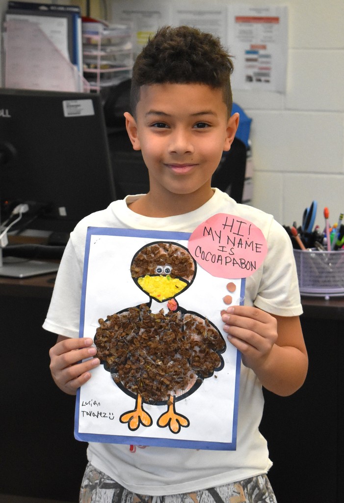 student with artwork