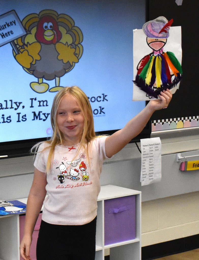 student with artwork 