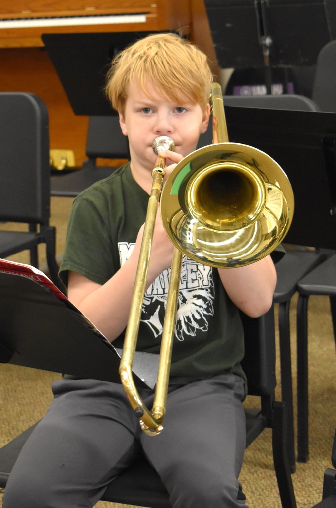 student with trombone