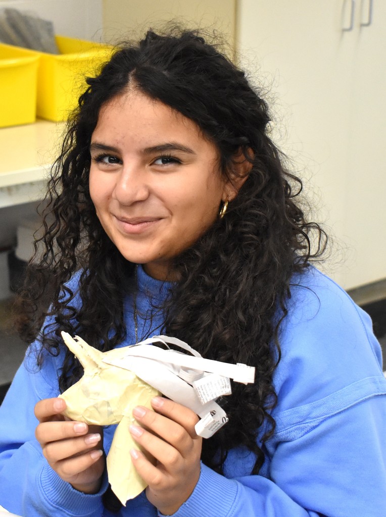 student in art class