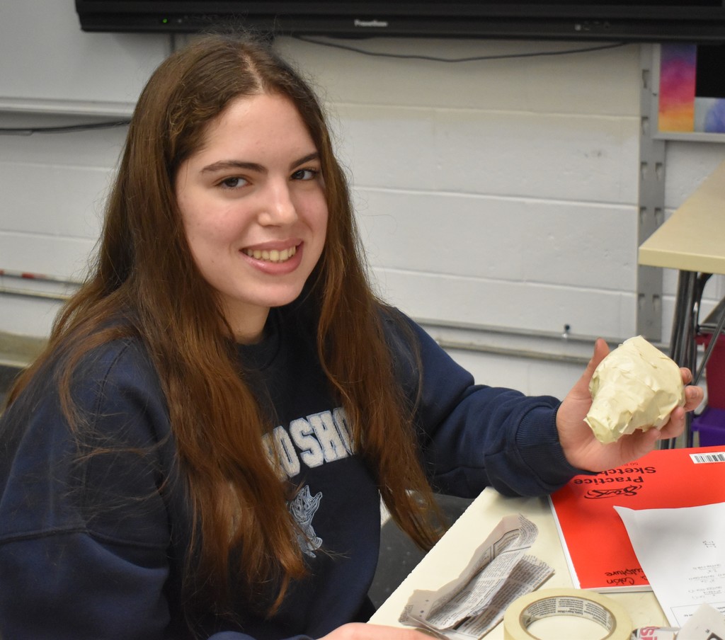 student in art class