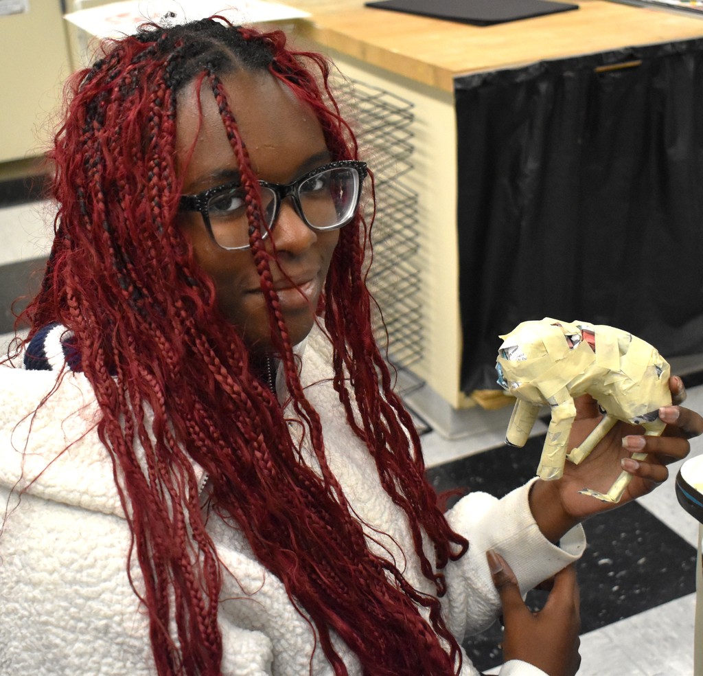 student in art class