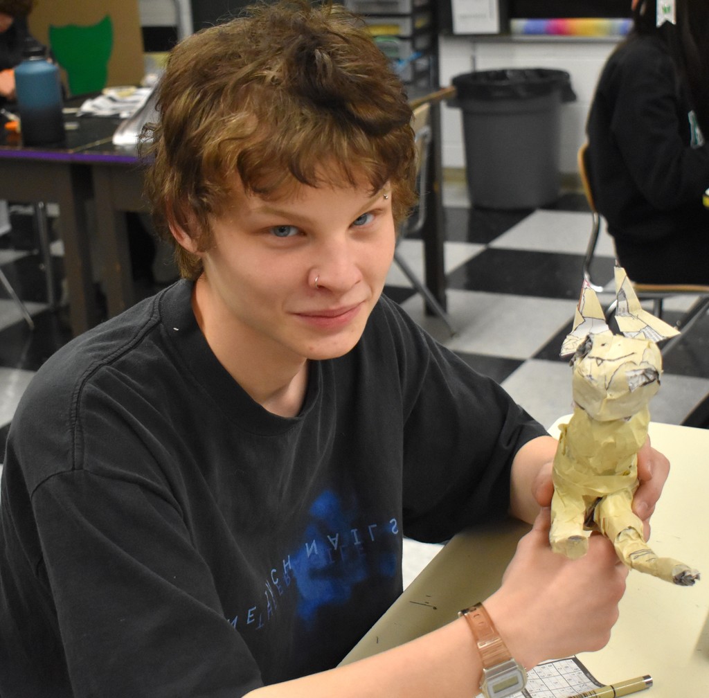 student in art class