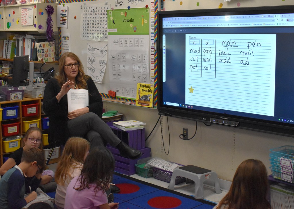 teacher with students