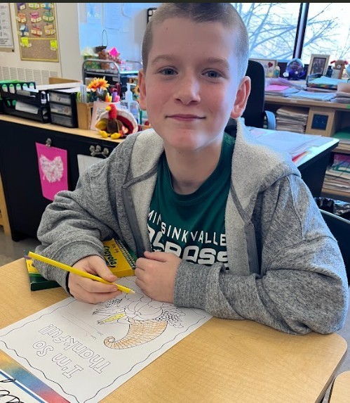 student with artwork