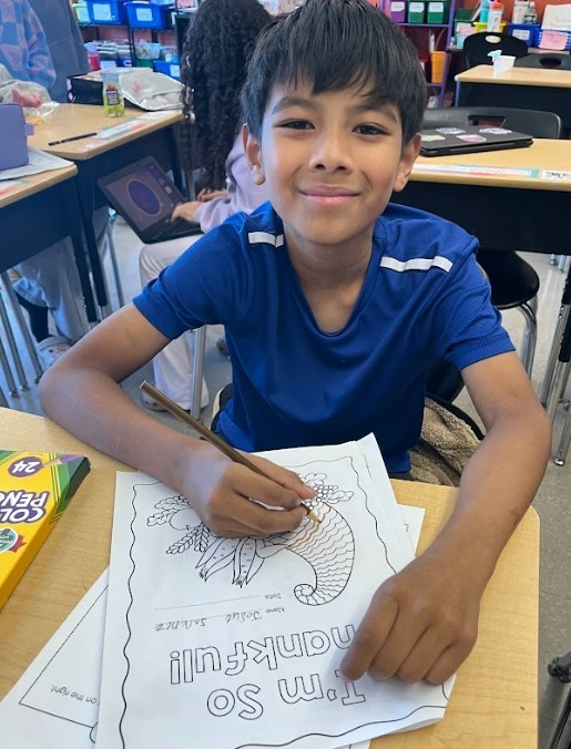 student with artwork