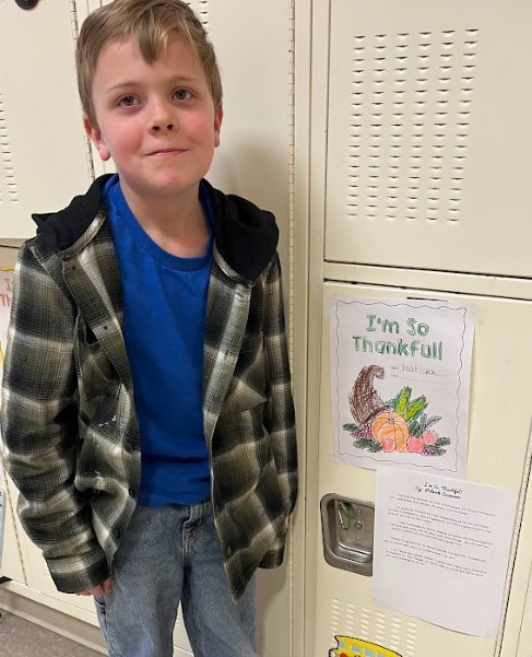 student with paperwork 