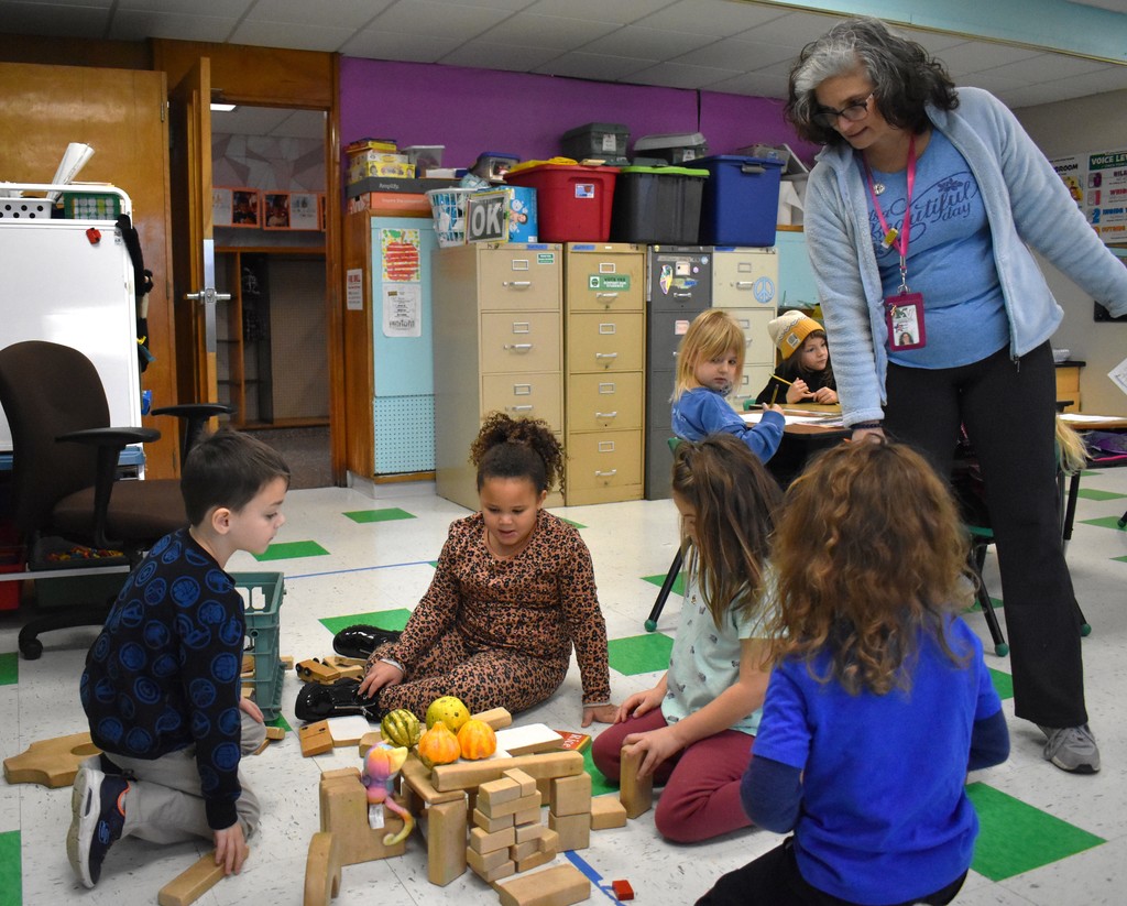 students in class with teacher