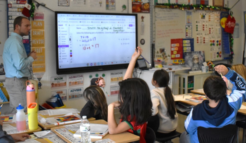 teacher in class with students