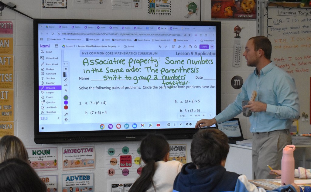 teacher in class with students