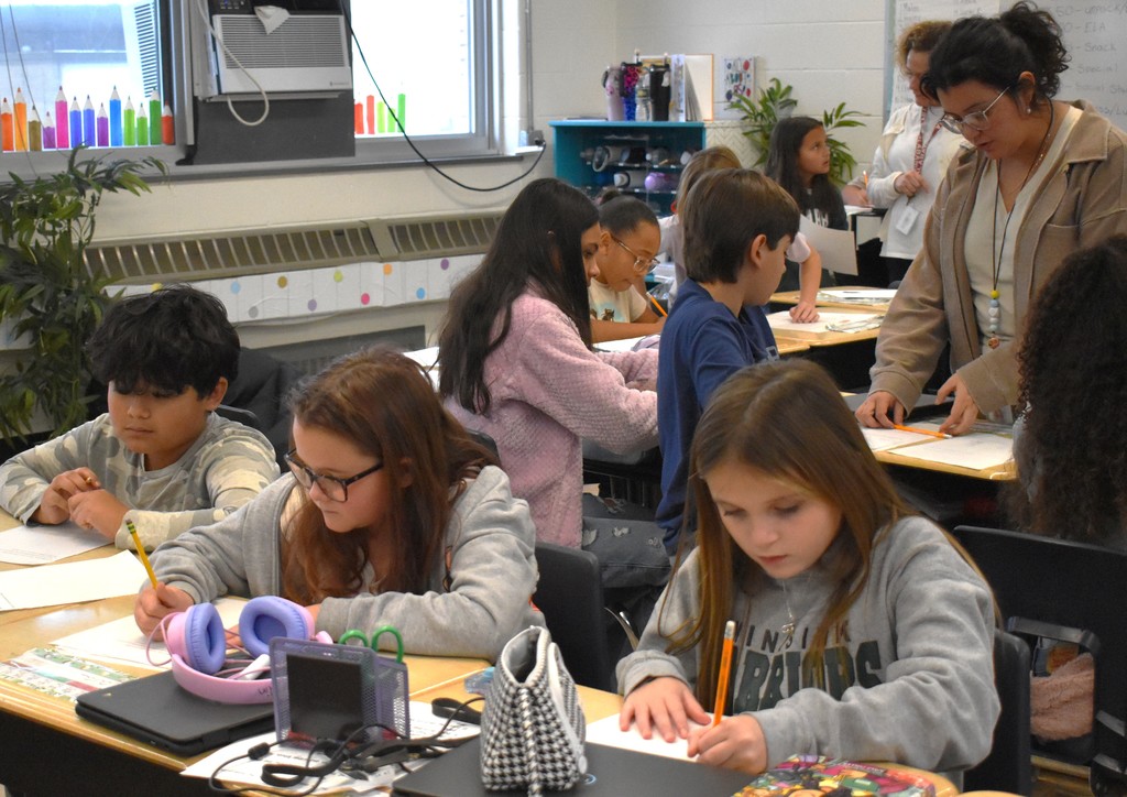 students in class doing math