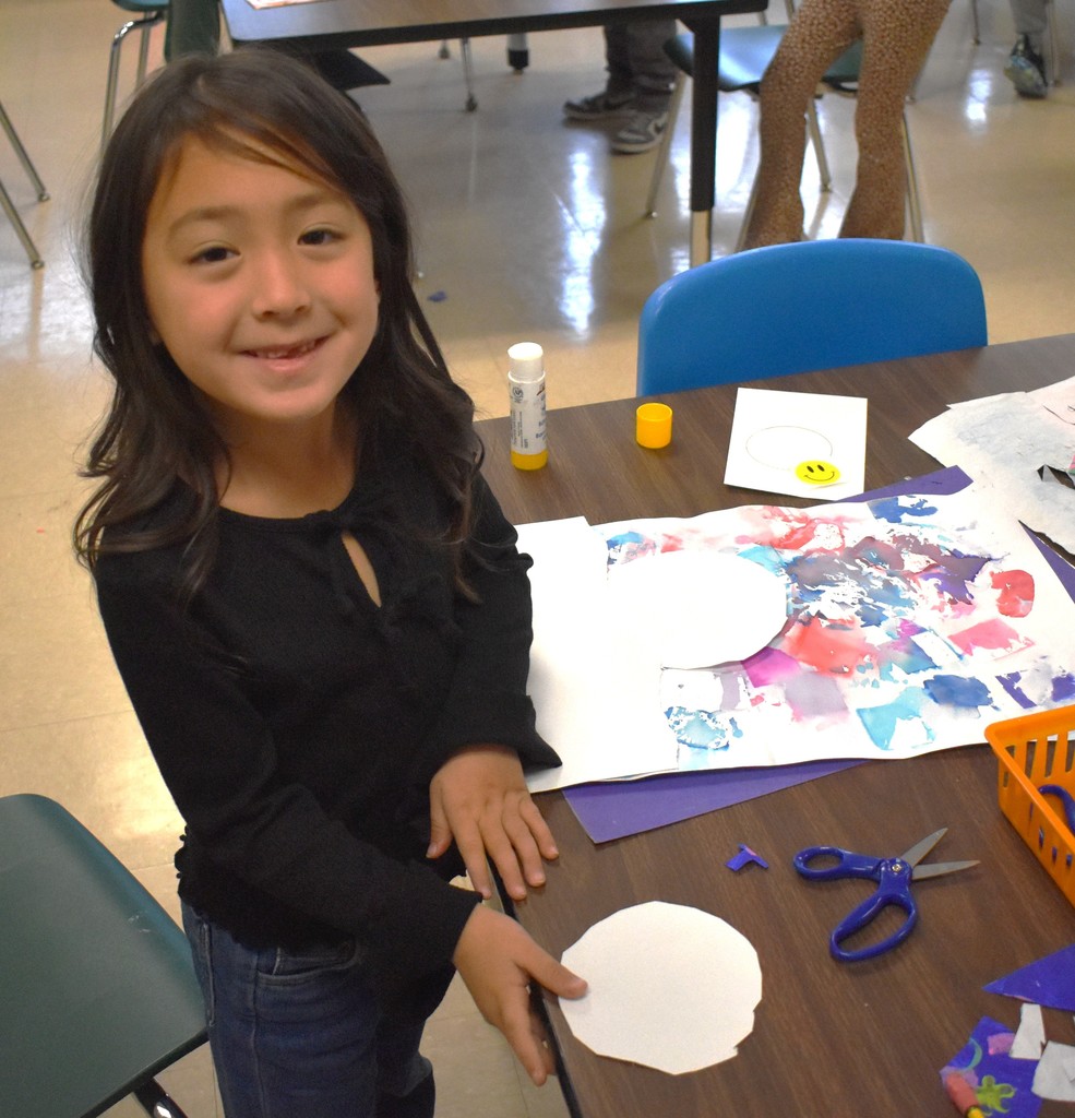 student in art class