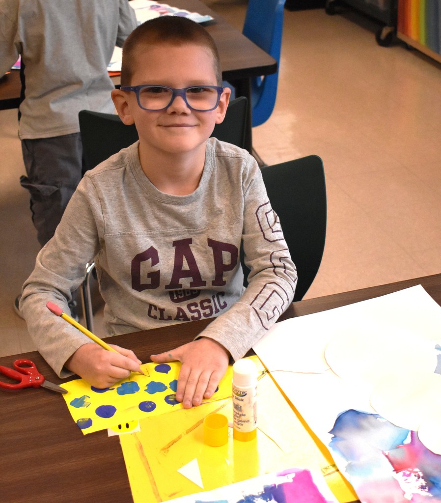 student in art class