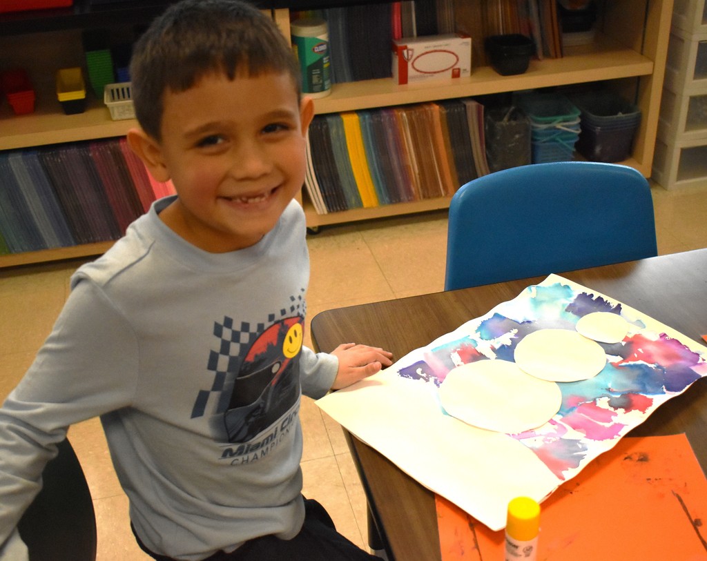 student in art class