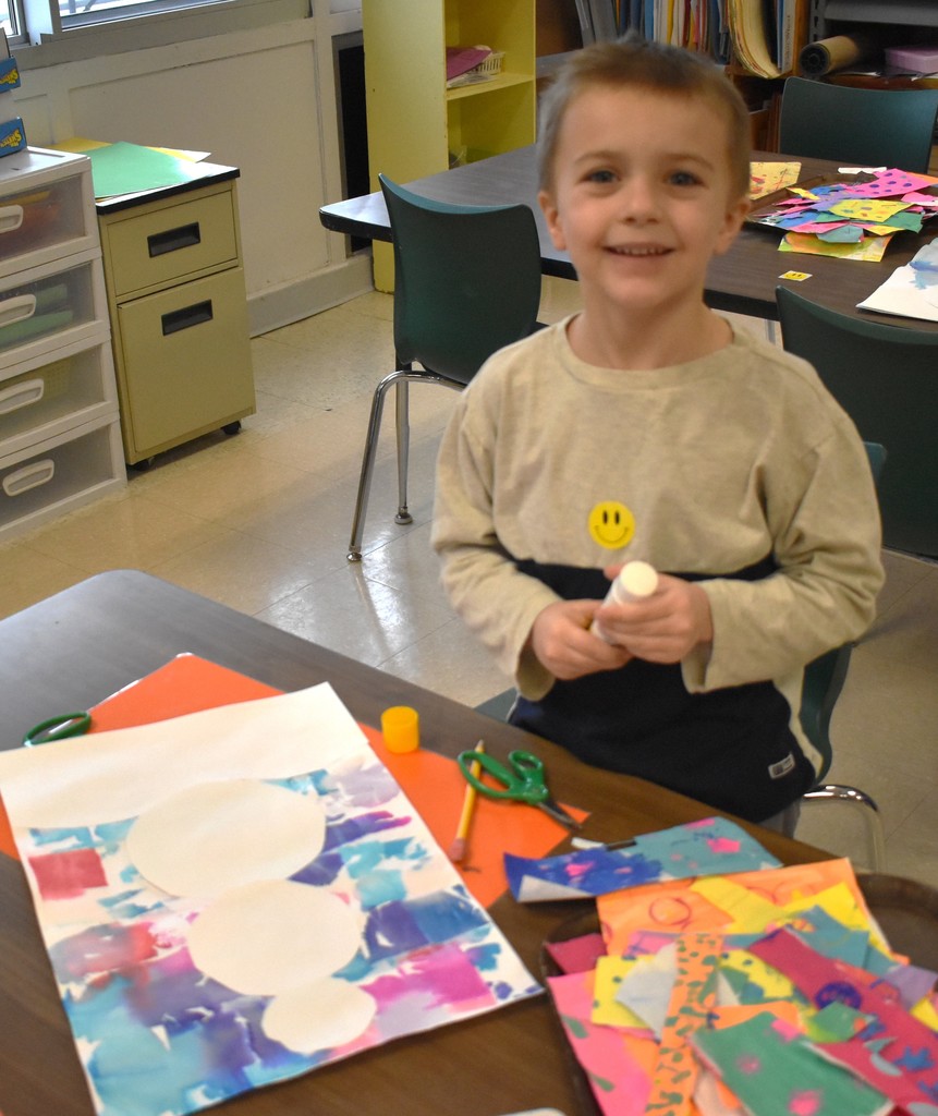 student in art class