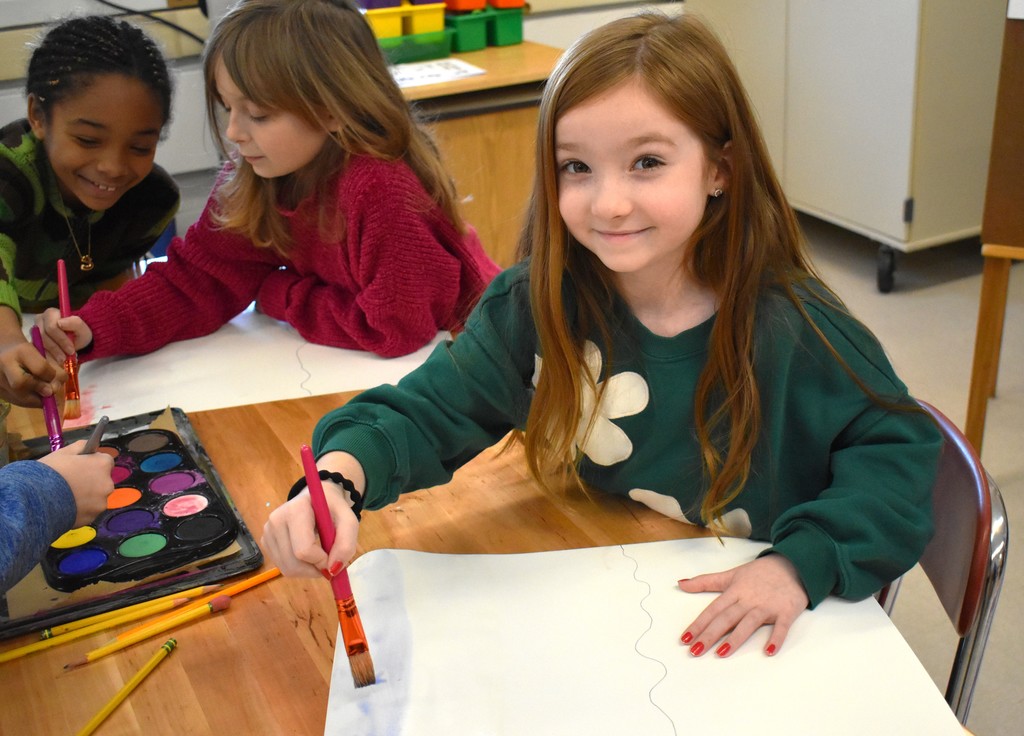 student in art class