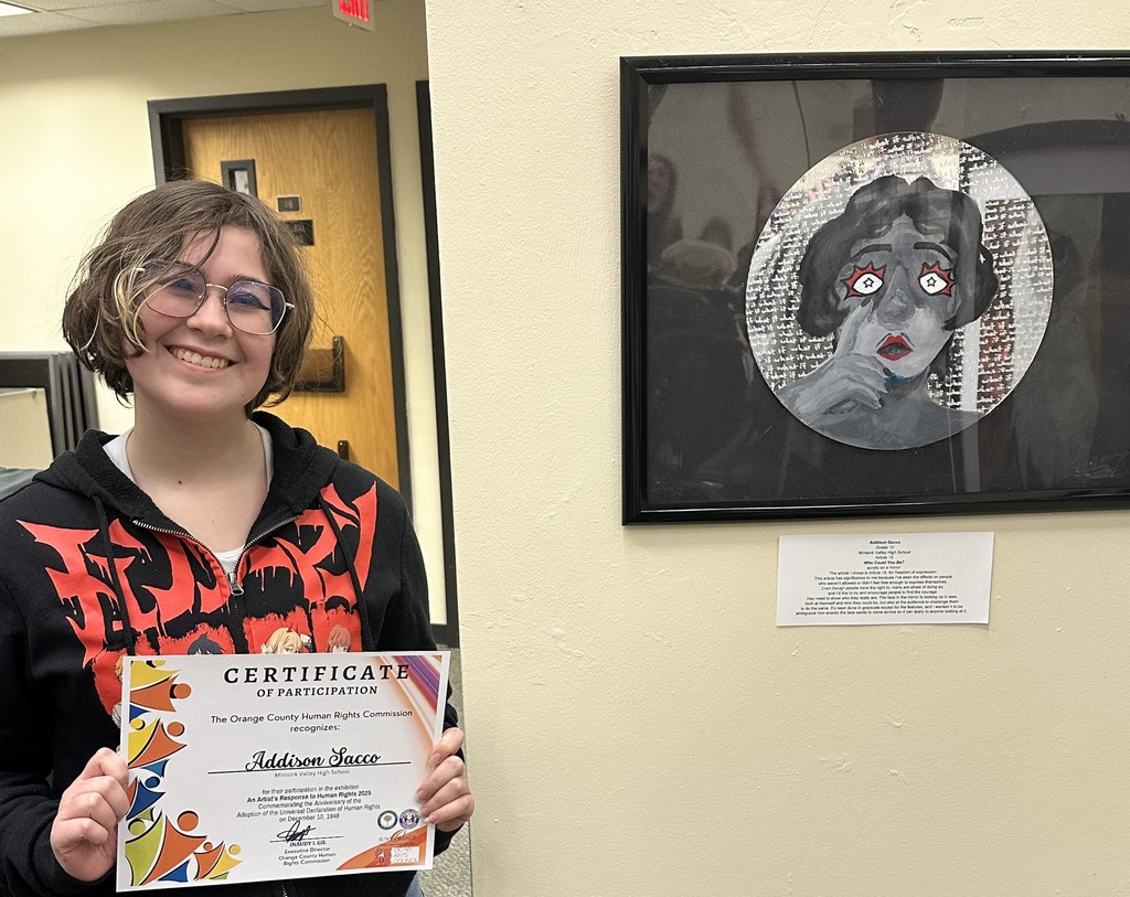 student at art exhibit