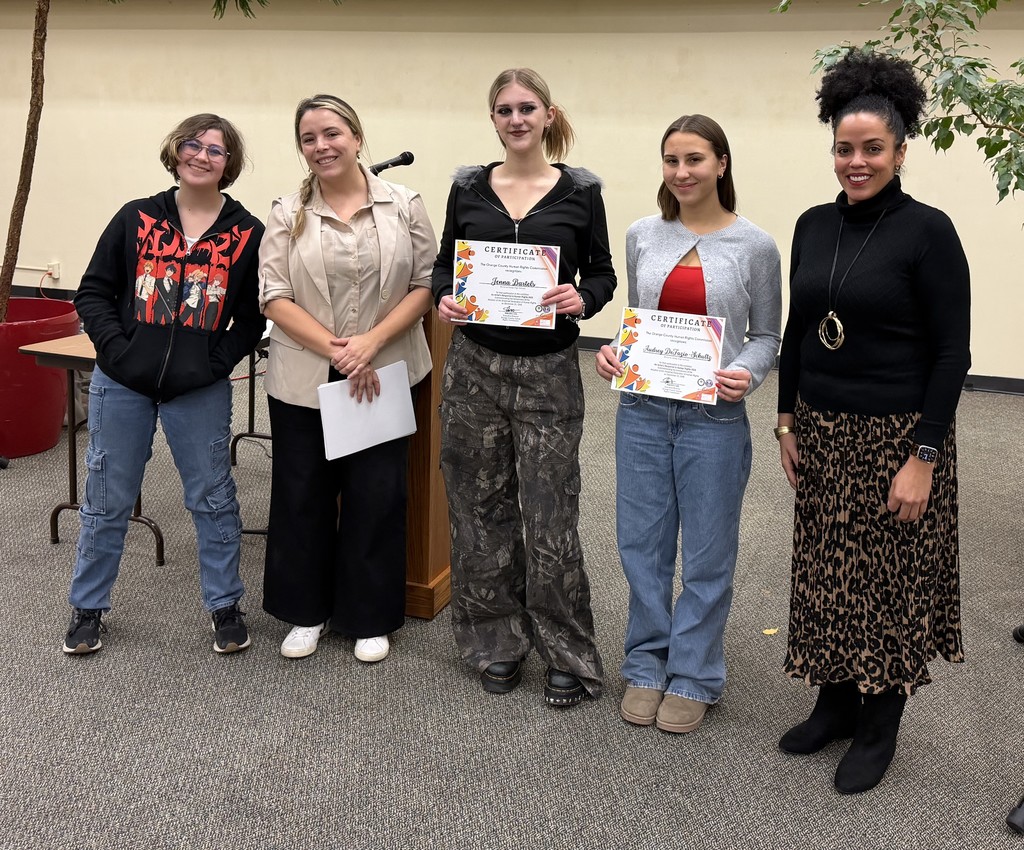 students at art exhibit