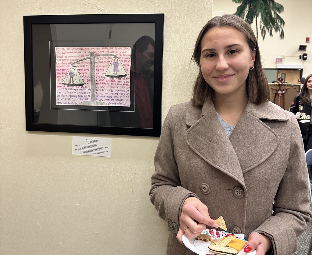 student at art exhibit