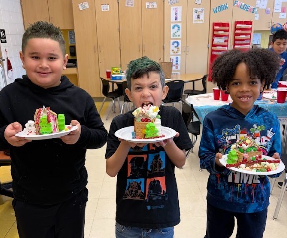 students with gingerbread houses
