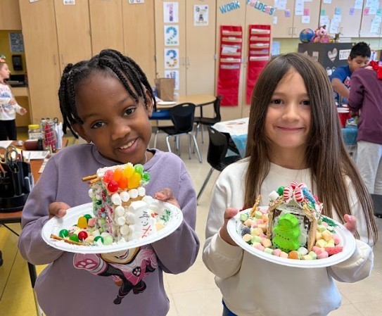students with gingerbread houses