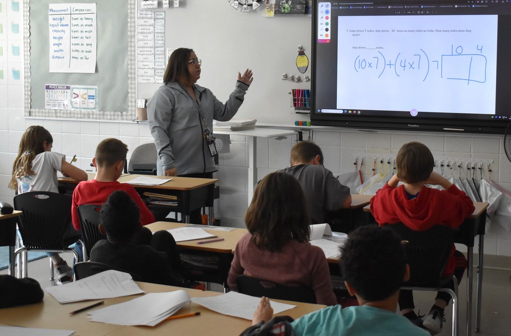 teacher in class with students