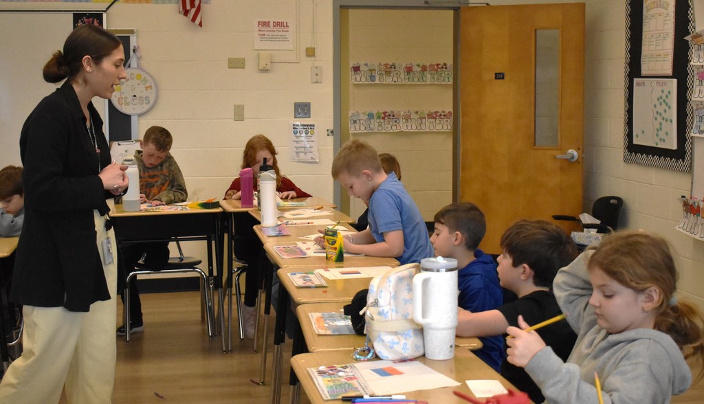 students and teacher in class