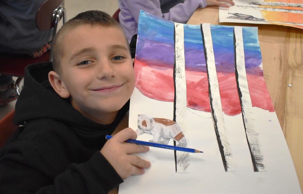 student in art class