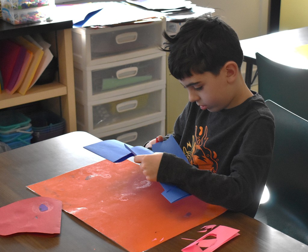 student in art class