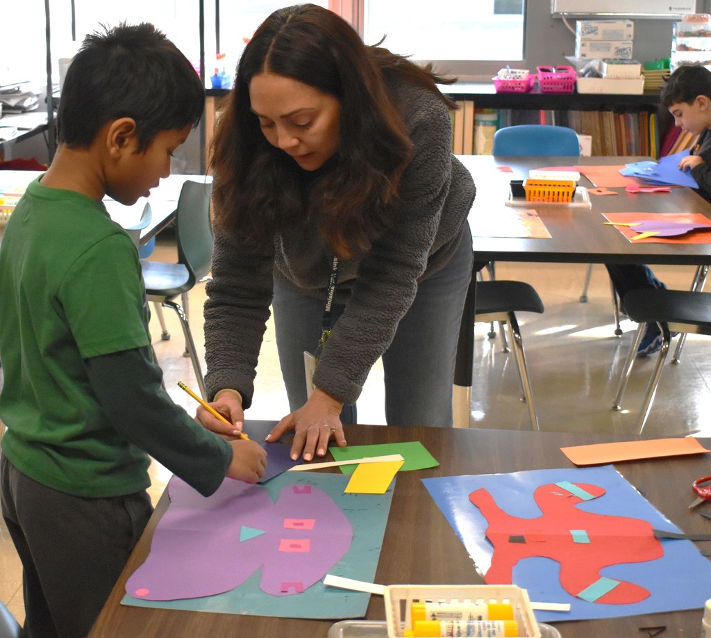 student in art class