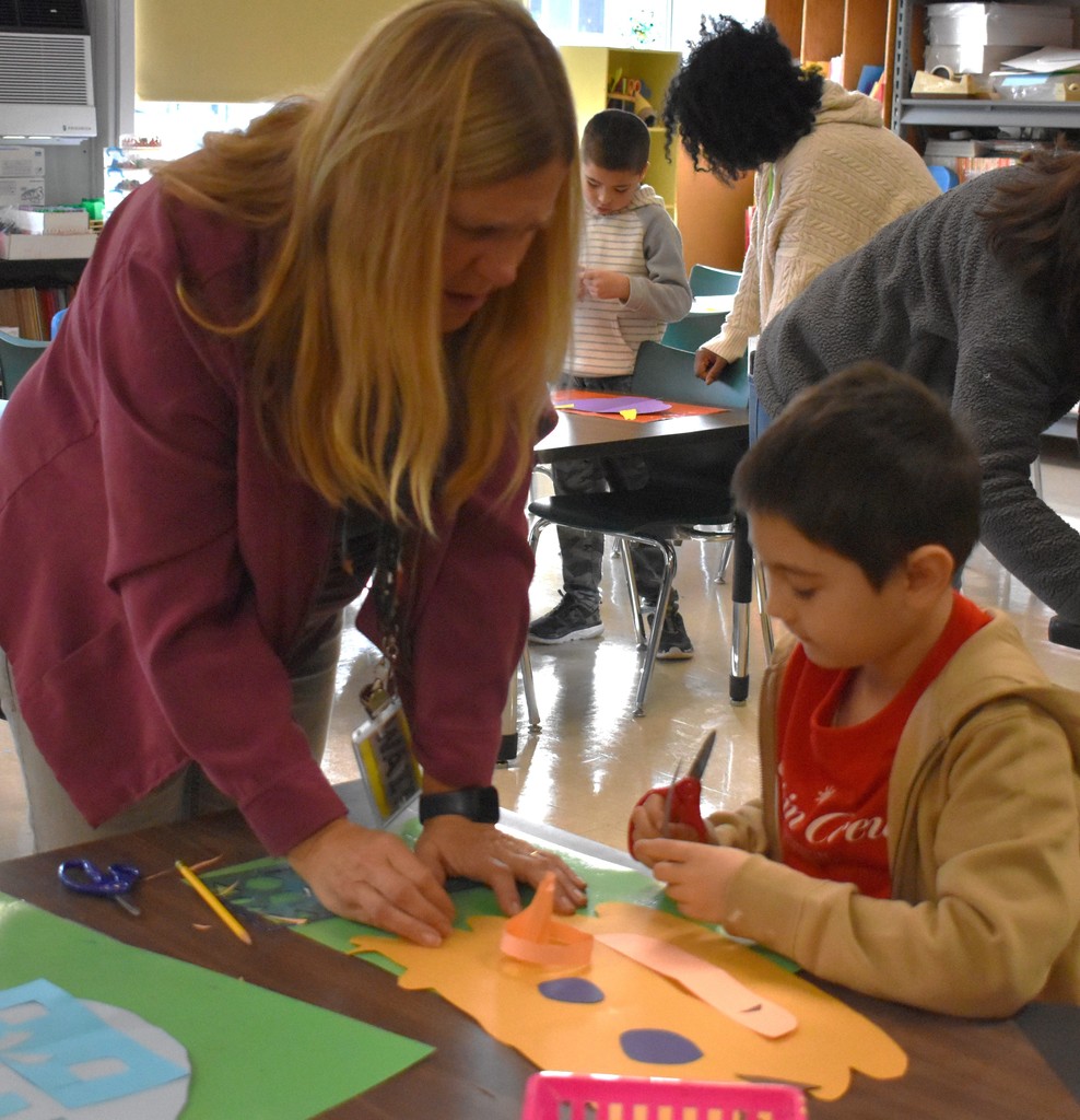 student in art class