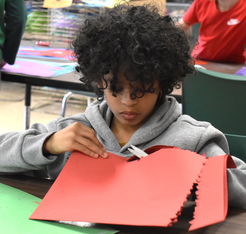 student in art class