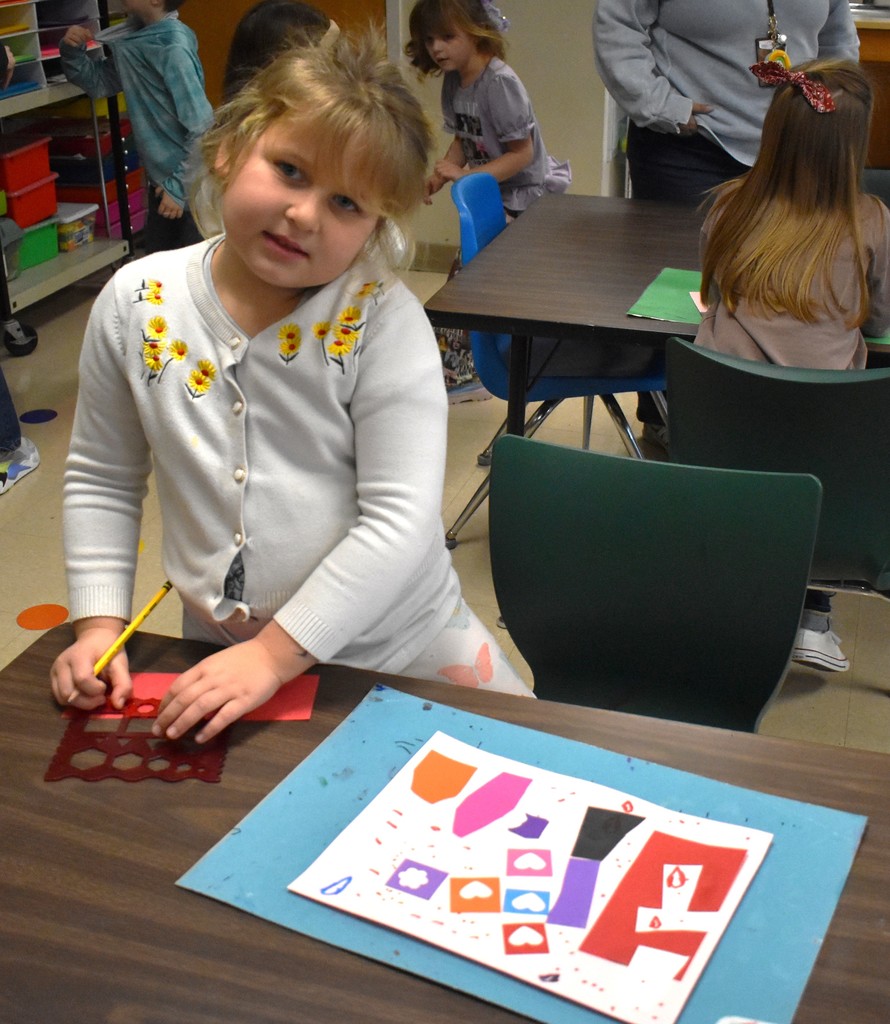 student in art class