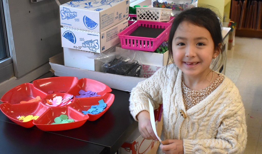 student in art class